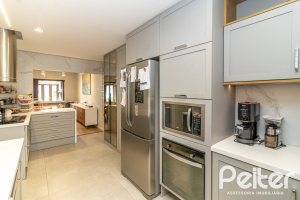 Casa em Condomínio à venda com 421m², 3 dormitórios, 3 suítes, 4 vagas, no bairro Tristeza em Porto Alegre