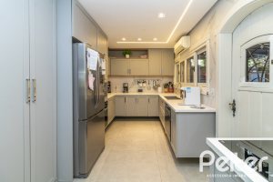 Casa em Condomínio à venda com 421m², 3 dormitórios, 3 suítes, 4 vagas, no bairro Tristeza em Porto Alegre