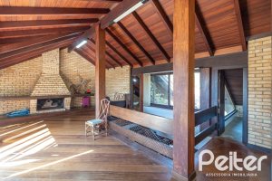 Casa em Condomínio à venda com 421m², 3 dormitórios, 3 suítes, 4 vagas, no bairro Tristeza em Porto Alegre