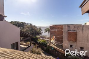 Casa em Condomínio à venda com 421m², 3 dormitórios, 3 suítes, 4 vagas, no bairro Tristeza em Porto Alegre