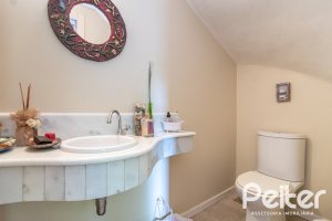 Casa em Condomínio à venda com 293m², 3 dormitórios, 1 suíte, 2 vagas, no bairro Tristeza em Porto Alegre