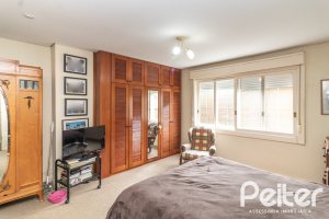 Casa em Condomínio à venda com 293m², 3 dormitórios, 1 suíte, 2 vagas, no bairro Tristeza em Porto Alegre