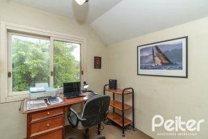 Casa em Condomínio à venda com 293m², 3 dormitórios, 1 suíte, 2 vagas, no bairro Tristeza em Porto Alegre