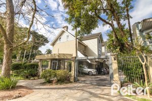 Casa em Condomínio à venda com 293m², 3 dormitórios, 1 suíte, 2 vagas, no bairro Tristeza em Porto Alegre