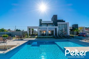 Casa em Condomínio à venda com 150m², 3 dormitórios, 3 suítes, 2 vagas, no bairro Ipanema em Porto Alegre