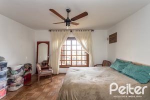 Casa à venda com 280m², 3 dormitórios, 1 suíte, 4 vagas, no bairro Tristeza em Porto Alegre