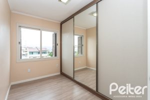 Apartamento à venda com 95m², 3 dormitórios, 1 suíte, 2 vagas, no bairro Tristeza em PORTO ALEGRE