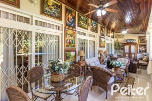 Casa à venda com 298m², 4 dormitórios, 1 suíte, 2 vagas, no bairro Ipanema em Porto Alegre