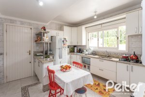 Casa à venda com 309m², 5 dormitórios, 3 suítes, 4 vagas, no bairro Ipanema em Porto Alegre