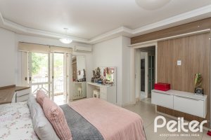 Casa à venda com 309m², 5 dormitórios, 3 suítes, 4 vagas, no bairro Ipanema em Porto Alegre