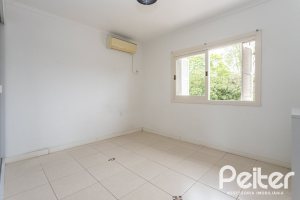 Casa à venda com 309m², 5 dormitórios, 3 suítes, 4 vagas, no bairro Ipanema em Porto Alegre