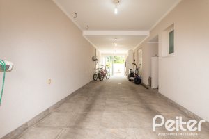Casa à venda com 309m², 5 dormitórios, 3 suítes, 4 vagas, no bairro Ipanema em Porto Alegre