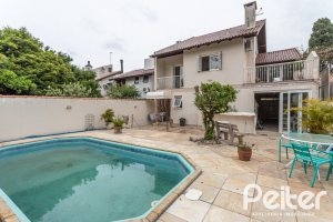 Casa à venda com 309m², 5 dormitórios, 3 suítes, 4 vagas, no bairro Ipanema em Porto Alegre