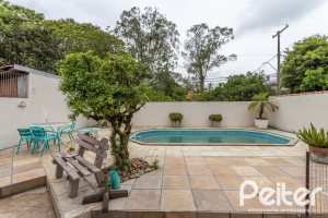 Casa à venda com 309m², 5 dormitórios, 3 suítes, 4 vagas, no bairro Ipanema em Porto Alegre