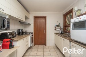 Casa em Condomínio à venda com 340m², 3 dormitórios, 1 suíte, 2 vagas, no bairro Jardim Isabel em Porto Alegre