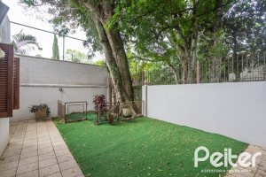Casa em Condomínio à venda com 340m², 3 dormitórios, 1 suíte, 2 vagas, no bairro Jardim Isabel em Porto Alegre