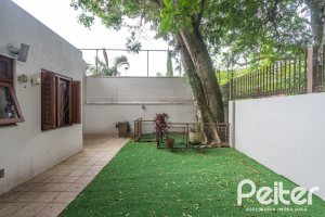 Casa em Condomínio à venda com 340m², 3 dormitórios, 1 suíte, 2 vagas, no bairro Jardim Isabel em Porto Alegre