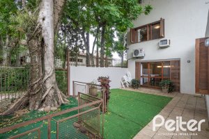 Casa em Condomínio à venda com 340m², 3 dormitórios, 1 suíte, 2 vagas, no bairro Jardim Isabel em Porto Alegre