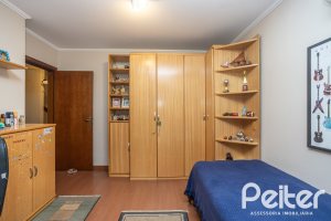 Casa em Condomínio à venda com 340m², 3 dormitórios, 1 suíte, 2 vagas, no bairro Jardim Isabel em Porto Alegre