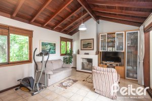 Casa em Condomínio à venda com 340m², 3 dormitórios, 1 suíte, 2 vagas, no bairro Jardim Isabel em Porto Alegre