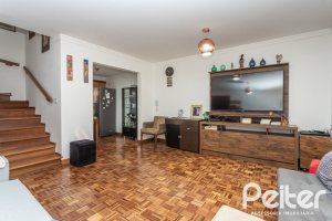 Casa em Condomínio à venda com 133m², 3 dormitórios, 1 suíte, 2 vagas, no bairro Tristeza em Porto Alegre