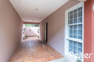 Casa em Condomínio à venda com 133m², 3 dormitórios, 1 suíte, 2 vagas, no bairro Tristeza em Porto Alegre