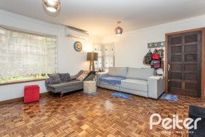 Casa em Condomínio à venda com 133m², 3 dormitórios, 1 suíte, 2 vagas, no bairro Tristeza em Porto Alegre