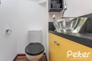 Casa em Condomínio à venda com 133m², 3 dormitórios, 1 suíte, 2 vagas, no bairro Tristeza em Porto Alegre