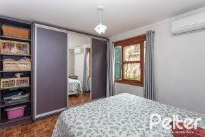 Casa em Condomínio à venda com 133m², 3 dormitórios, 1 suíte, 2 vagas, no bairro Tristeza em Porto Alegre