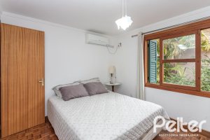 Casa em Condomínio à venda com 133m², 3 dormitórios, 1 suíte, 2 vagas, no bairro Tristeza em Porto Alegre