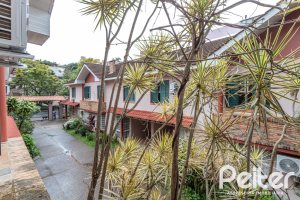 Casa em Condomínio à venda com 133m², 3 dormitórios, 1 suíte, 2 vagas, no bairro Tristeza em Porto Alegre