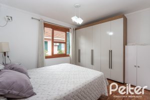 Casa em Condomínio à venda com 133m², 3 dormitórios, 1 suíte, 2 vagas, no bairro Tristeza em Porto Alegre