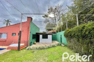 Casa à venda com 338m², 6 dormitórios, 3 suítes, 4 vagas, no bairro Ipanema em Porto Alegre