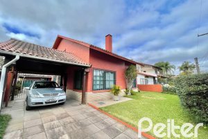 Casa à venda com 338m², 6 dormitórios, 3 suítes, 4 vagas, no bairro Ipanema em Porto Alegre
