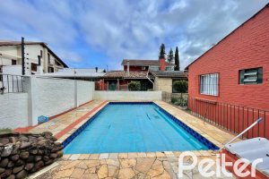 Casa à venda com 338m², 6 dormitórios, 3 suítes, 4 vagas, no bairro Ipanema em Porto Alegre