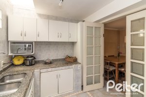 Casa em Condomínio à venda com 133m², 3 dormitórios, 1 suíte, 2 vagas, no bairro Tristeza em Porto Alegre