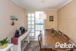 Casa em Condomínio à venda com 133m², 3 dormitórios, 1 suíte, 2 vagas, no bairro Tristeza em Porto Alegre