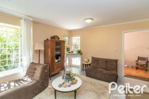 Casa em Condomínio à venda com 133m², 3 dormitórios, 1 suíte, 2 vagas, no bairro Tristeza em Porto Alegre