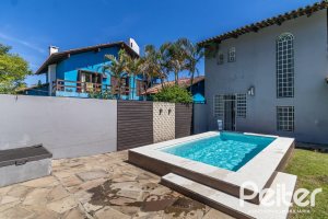 Casa à venda com 356m², 3 dormitórios, 2 suítes, 3 vagas, no bairro Ipanema em Porto Alegre