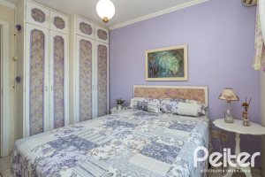 Casa em Condomínio à venda com 252m², 3 dormitórios, 2 suítes, 3 vagas, no bairro Vila Assunção em Porto Alegre