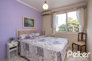 Casa em Condomínio à venda com 252m², 3 dormitórios, 2 suítes, 3 vagas, no bairro Vila Assunção em Porto Alegre