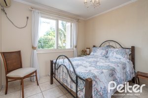 Casa em Condomínio à venda com 252m², 3 dormitórios, 2 suítes, 3 vagas, no bairro Vila Assunção em Porto Alegre