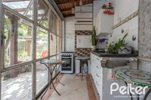 Casa em Condomínio à venda com 252m², 3 dormitórios, 2 suítes, 3 vagas, no bairro Vila Assunção em Porto Alegre