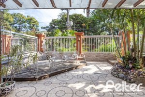 Casa em Condomínio à venda com 252m², 3 dormitórios, 2 suítes, 3 vagas, no bairro Vila Assunção em Porto Alegre