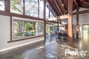 Casa em Condomínio à venda com 196m², 3 dormitórios, 1 suíte, 4 vagas, no bairro Terra Ville em PORTO ALEGRE