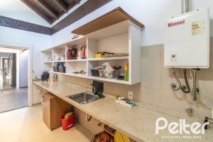 Casa em Condomínio à venda com 196m², 3 dormitórios, 1 suíte, 4 vagas, no bairro Terra Ville em PORTO ALEGRE