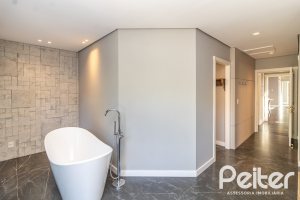 Casa em Condomínio à venda com 196m², 3 dormitórios, 1 suíte, 4 vagas, no bairro Terra Ville em PORTO ALEGRE