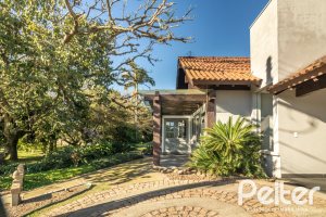 Casa em Condomínio à venda com 196m², 3 dormitórios, 1 suíte, 4 vagas, no bairro Terra Ville em PORTO ALEGRE