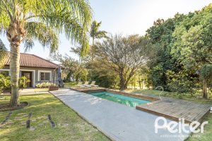 Casa em Condomínio à venda com 196m², 3 dormitórios, 1 suíte, 4 vagas, no bairro Terra Ville em PORTO ALEGRE