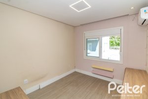 Casa em Condomínio à venda com 159m², 3 dormitórios, 1 suíte, 2 vagas, no bairro Tristeza em PORTO ALEGRE